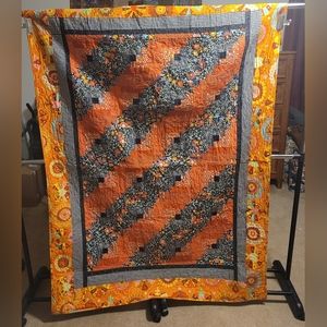 54 wide by 74 long Throw Quilt